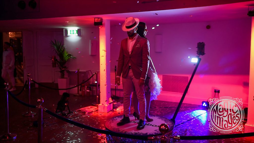 Two people enjoying the 360 video booth